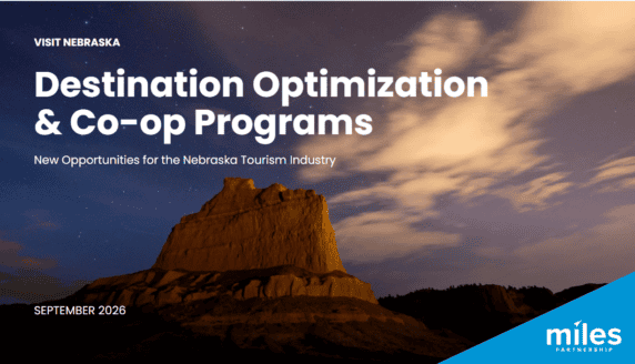 A rocky formation under a cloudy twilight sky illustrates a presentation slide titled “Destination Optimization & Co-op Programs” for Nebraska tourism, dated September 2026.